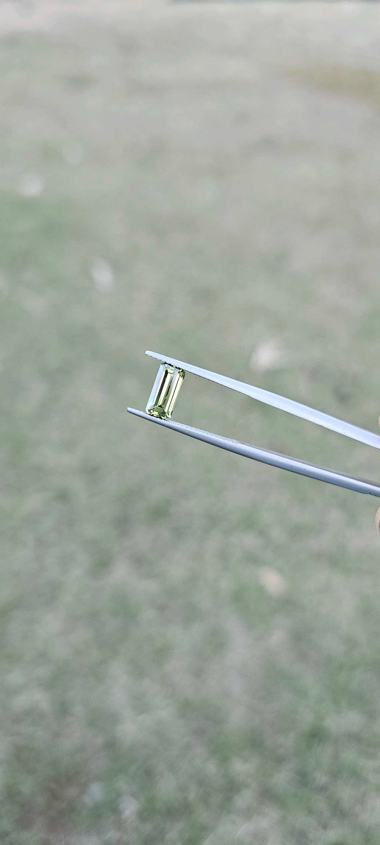 1.960ct pale green emerald cut sapphire - Evolution Gemstones