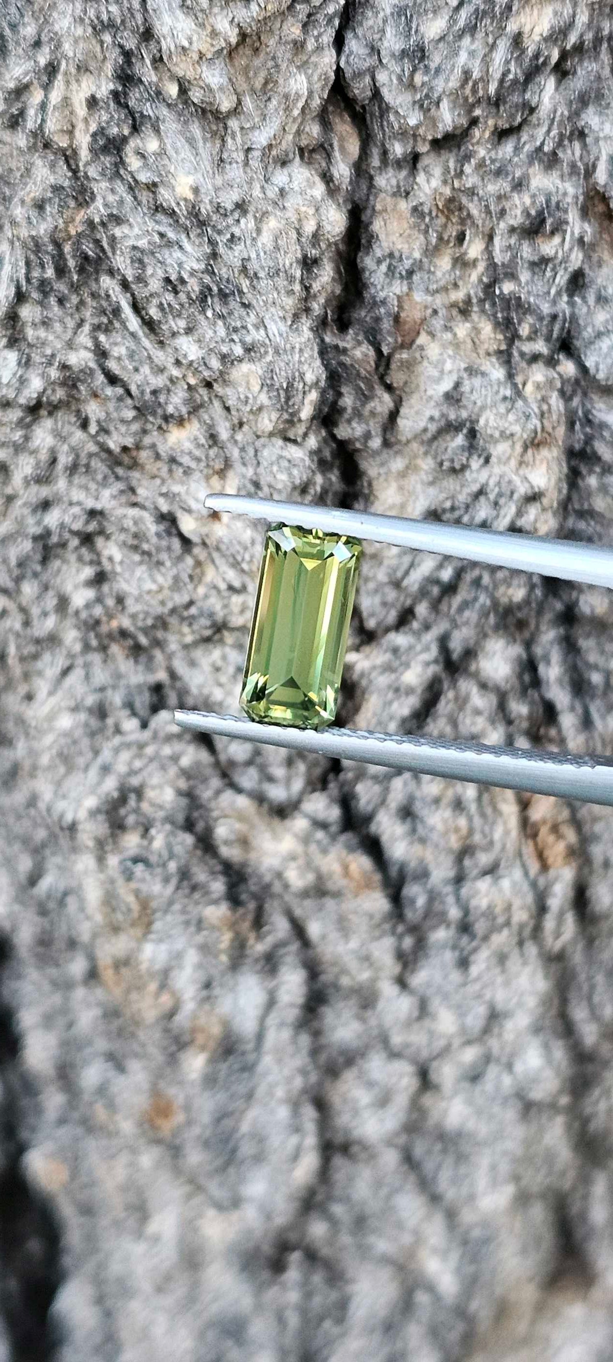 1.960ct pale green emerald cut sapphire - Evolution Gemstones