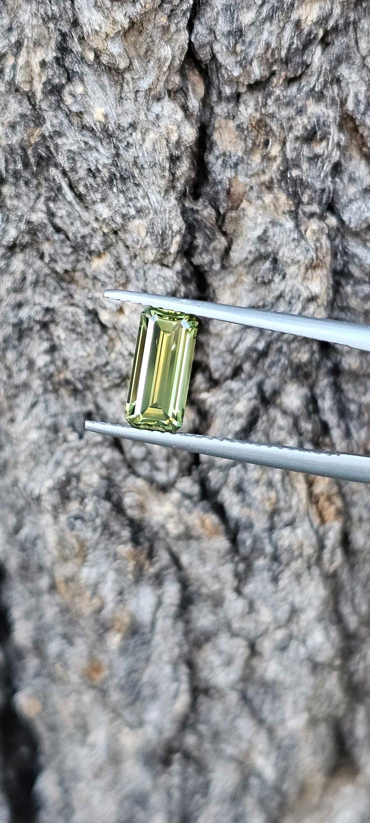 1.960ct pale green emerald cut sapphire - Evolution Gemstones