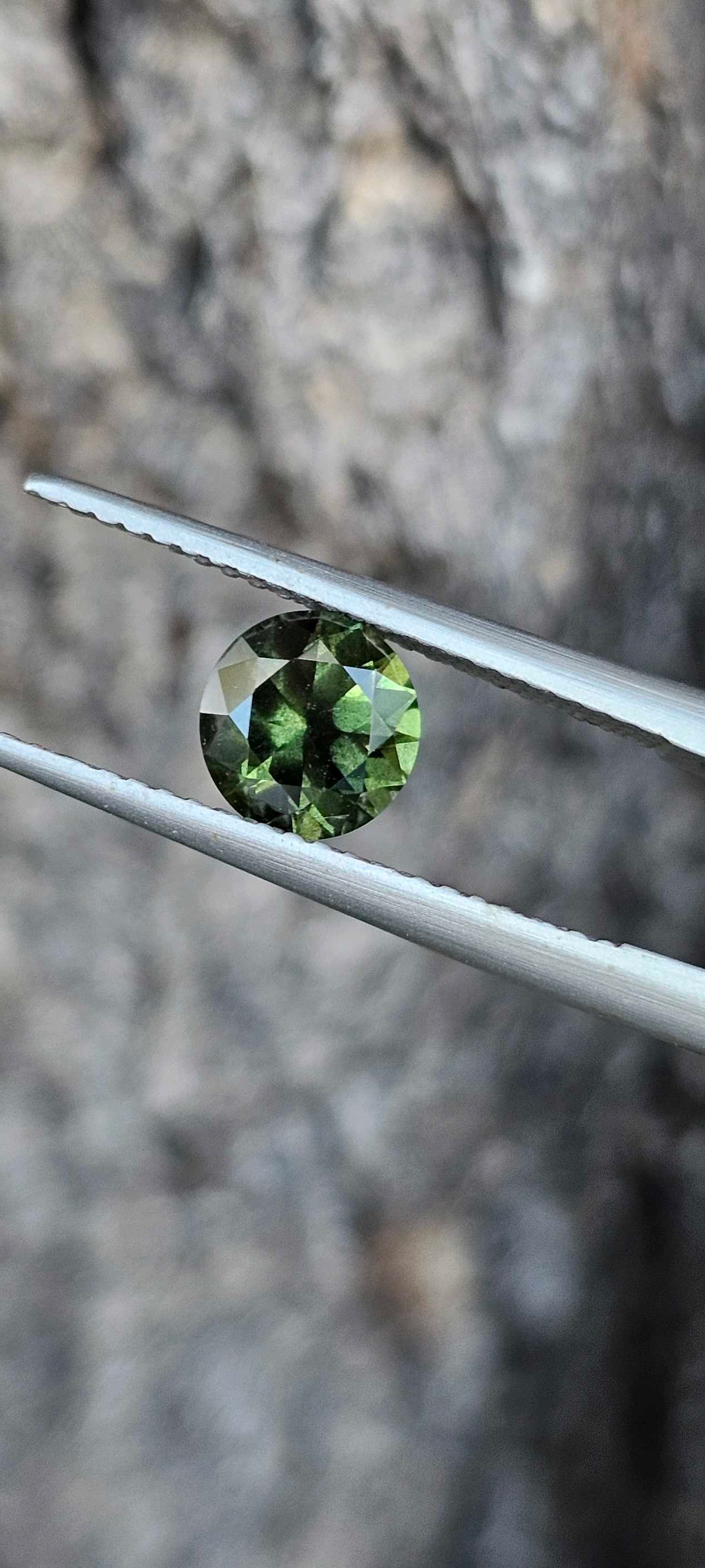 1.315ct Peppered green sapphire - Evolution Gemstones