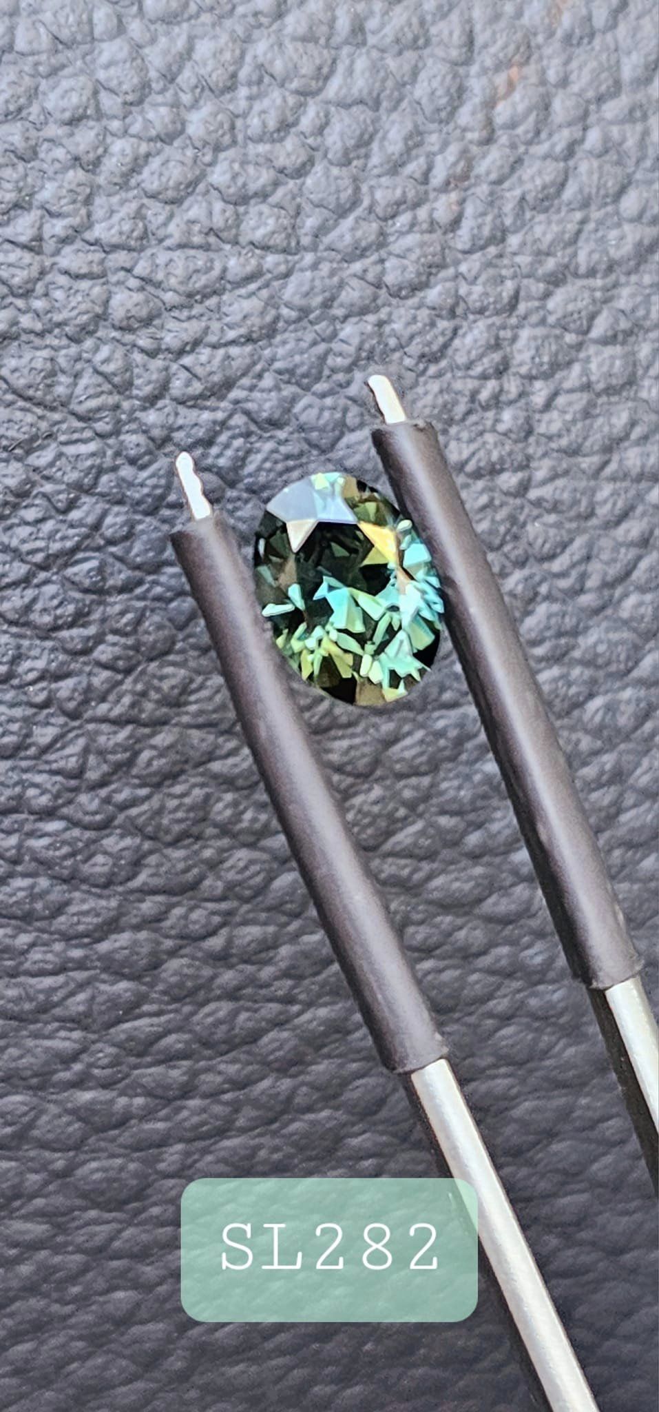 Teal leading green ripper oval - Evolution Gemstones