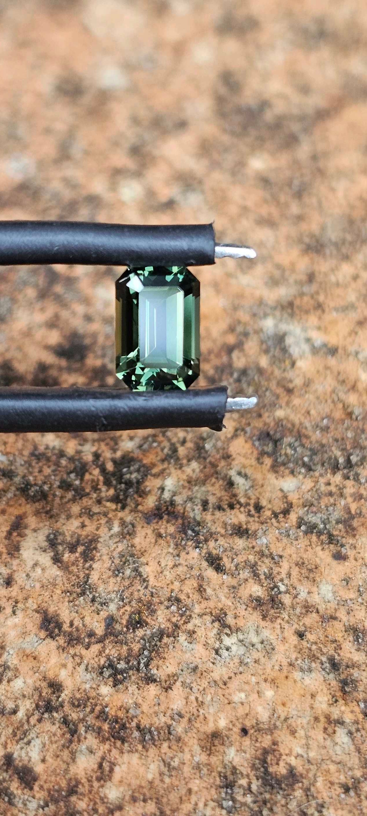 0.78ct forest green sapphire - Evolution Gemstones