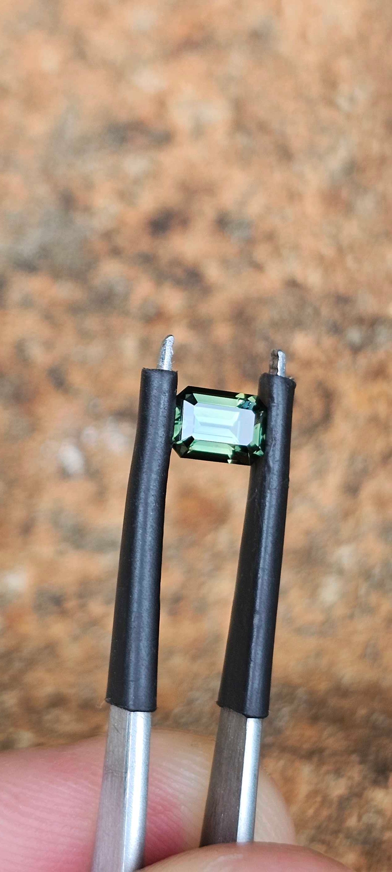 0.78ct forest green sapphire - Evolution Gemstones