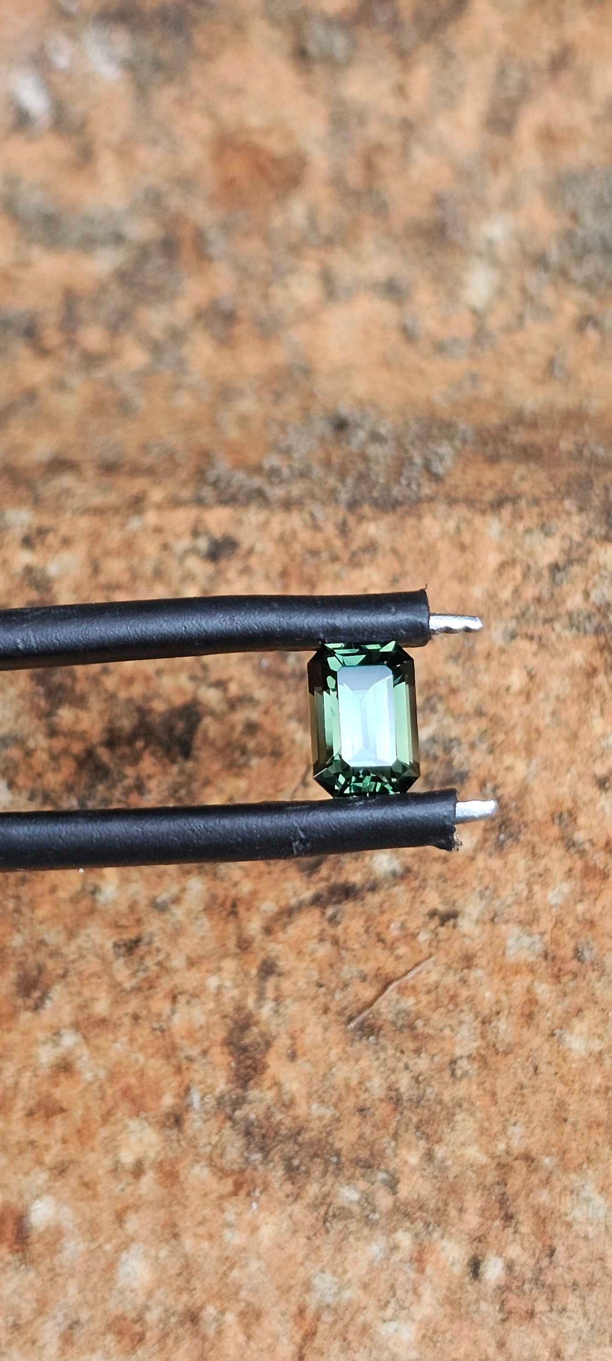 0.78ct forest green sapphire - Evolution Gemstones