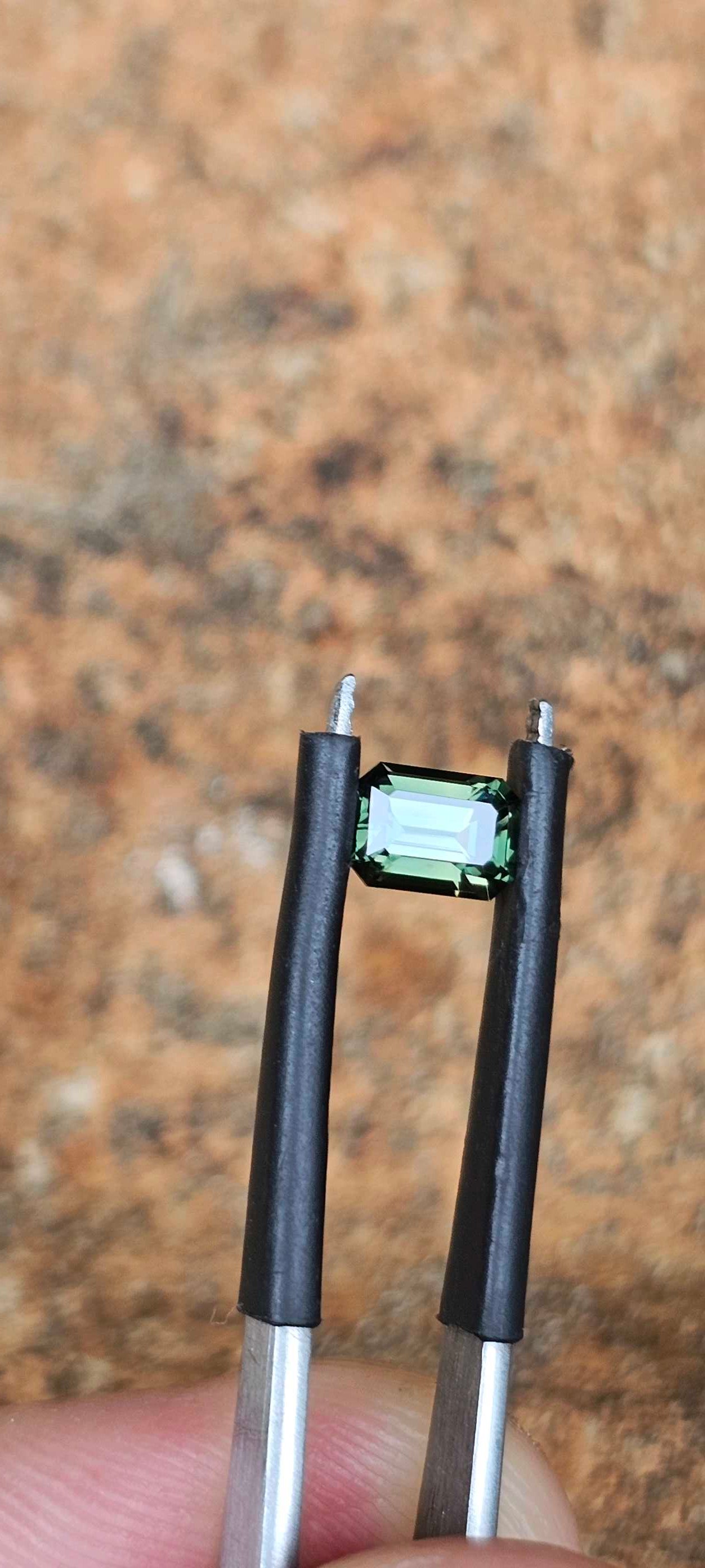 0.78ct forest green sapphire - Evolution Gemstones