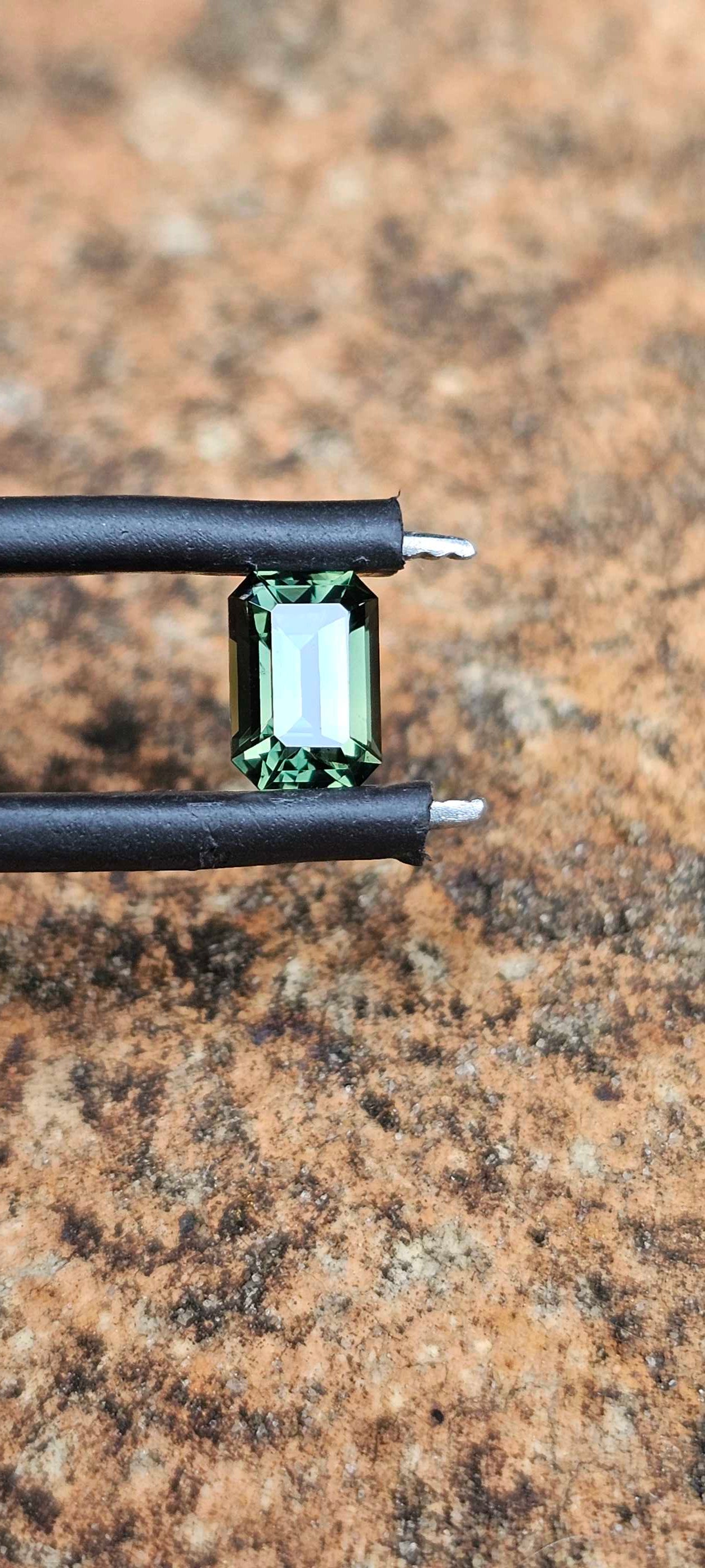 0.78ct forest green sapphire - Evolution Gemstones