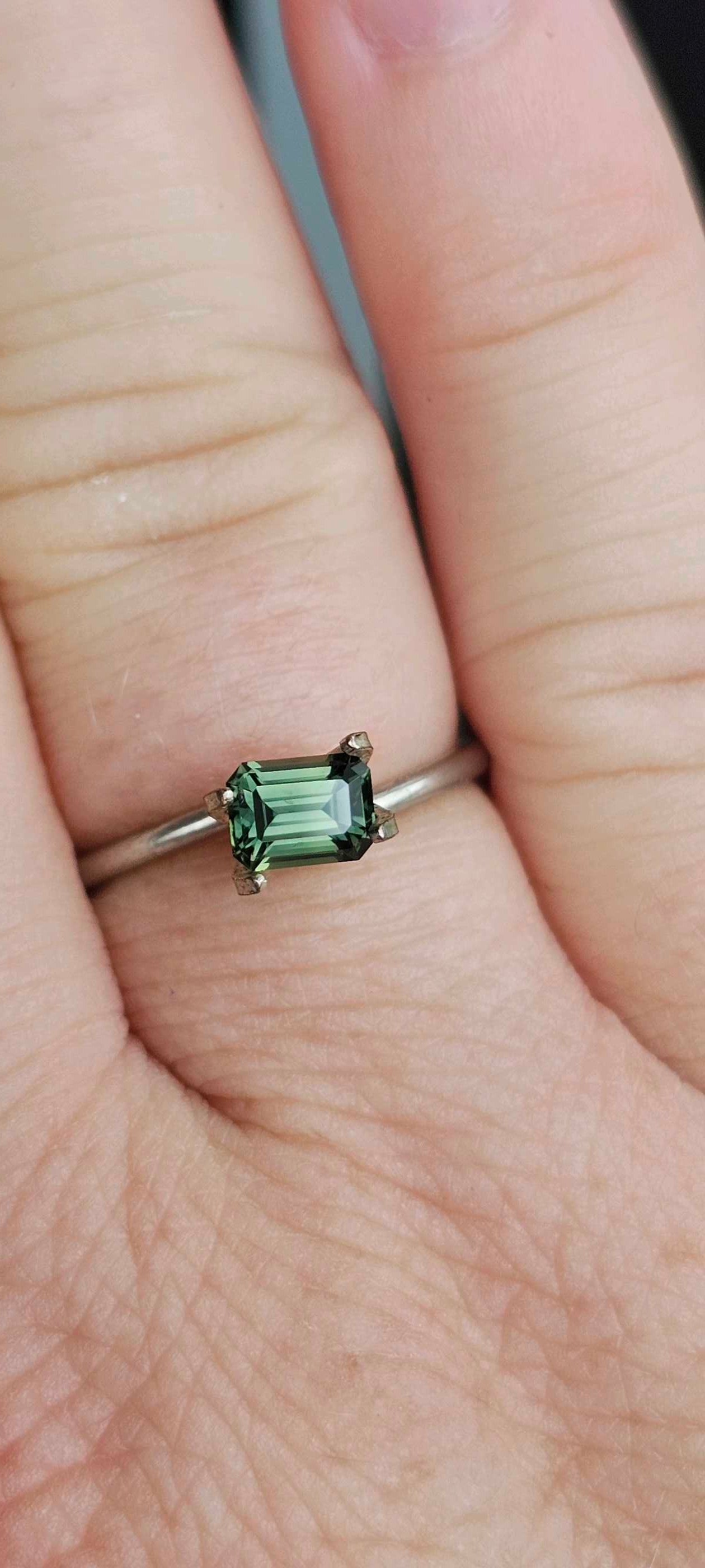 0.78ct forest green sapphire - Evolution Gemstones