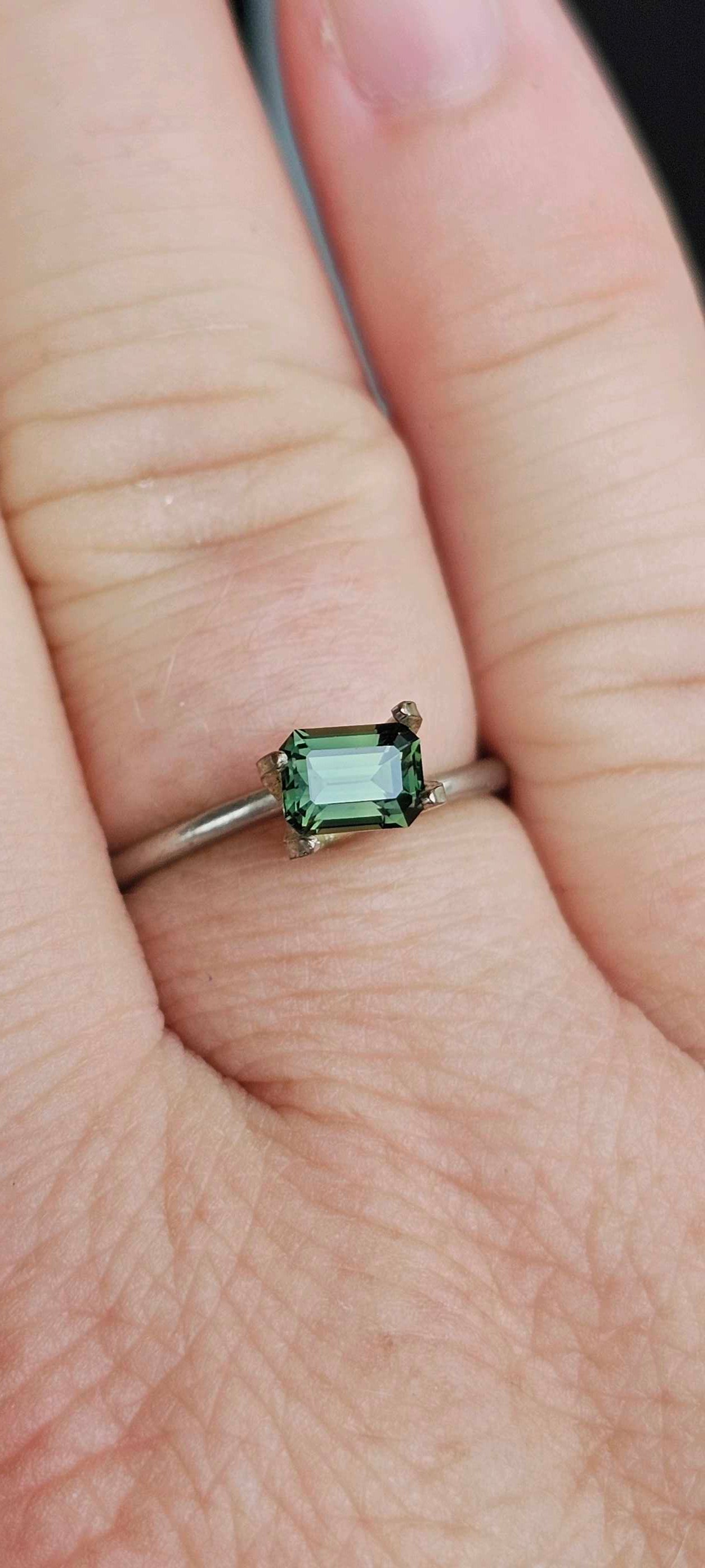 0.78ct forest green sapphire - Evolution Gemstones