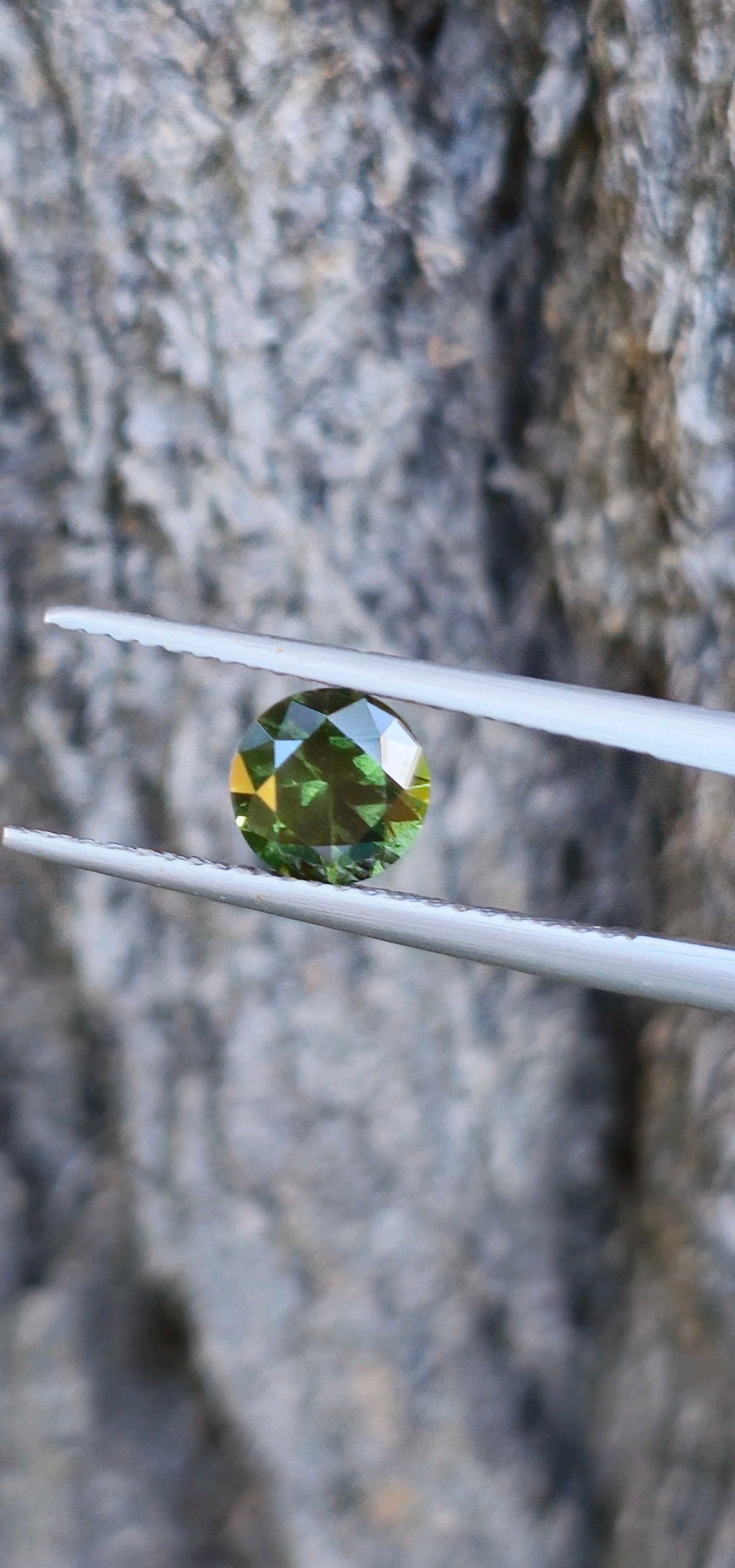 1.315ct Peppered green sapphire - Evolution Gemstones