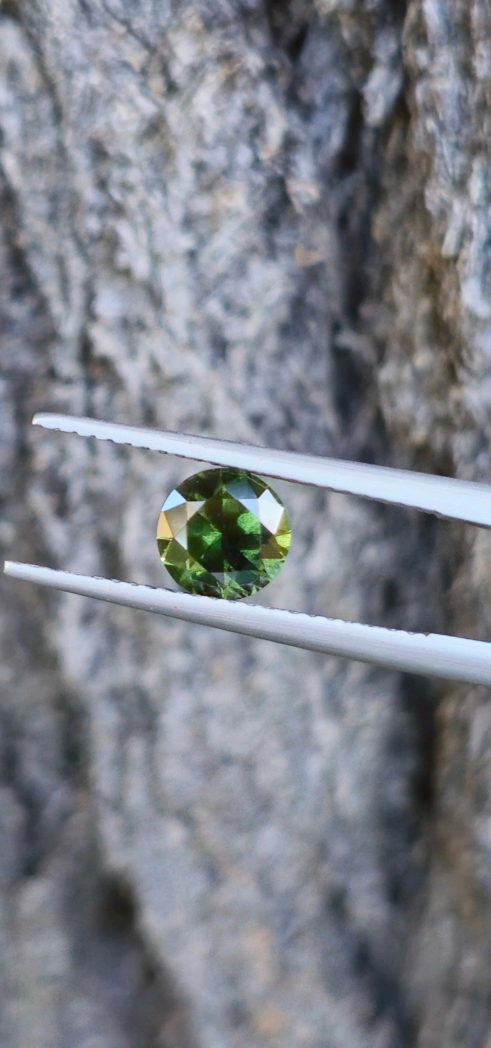 1.315ct Peppered green sapphire - Evolution Gemstones