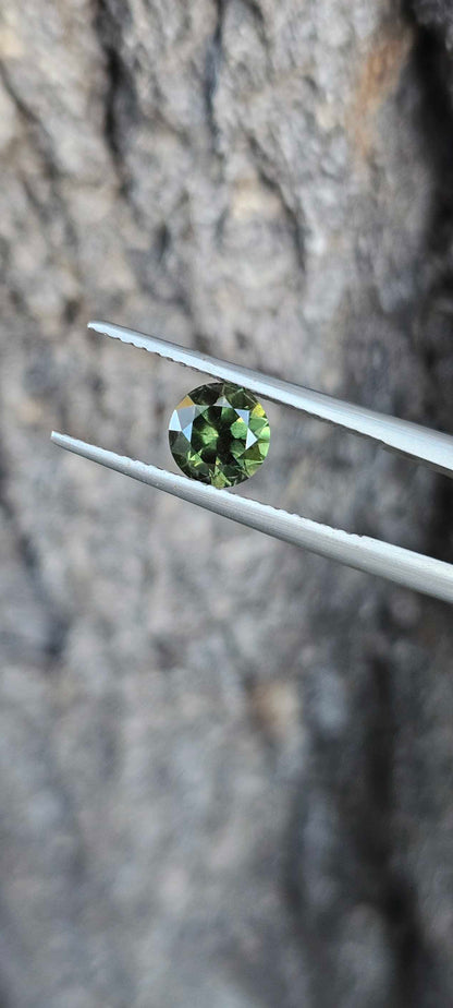 1.315ct Peppered green sapphire - Evolution Gemstones
