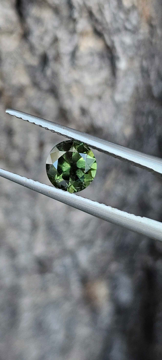 1.315ct Peppered green sapphire