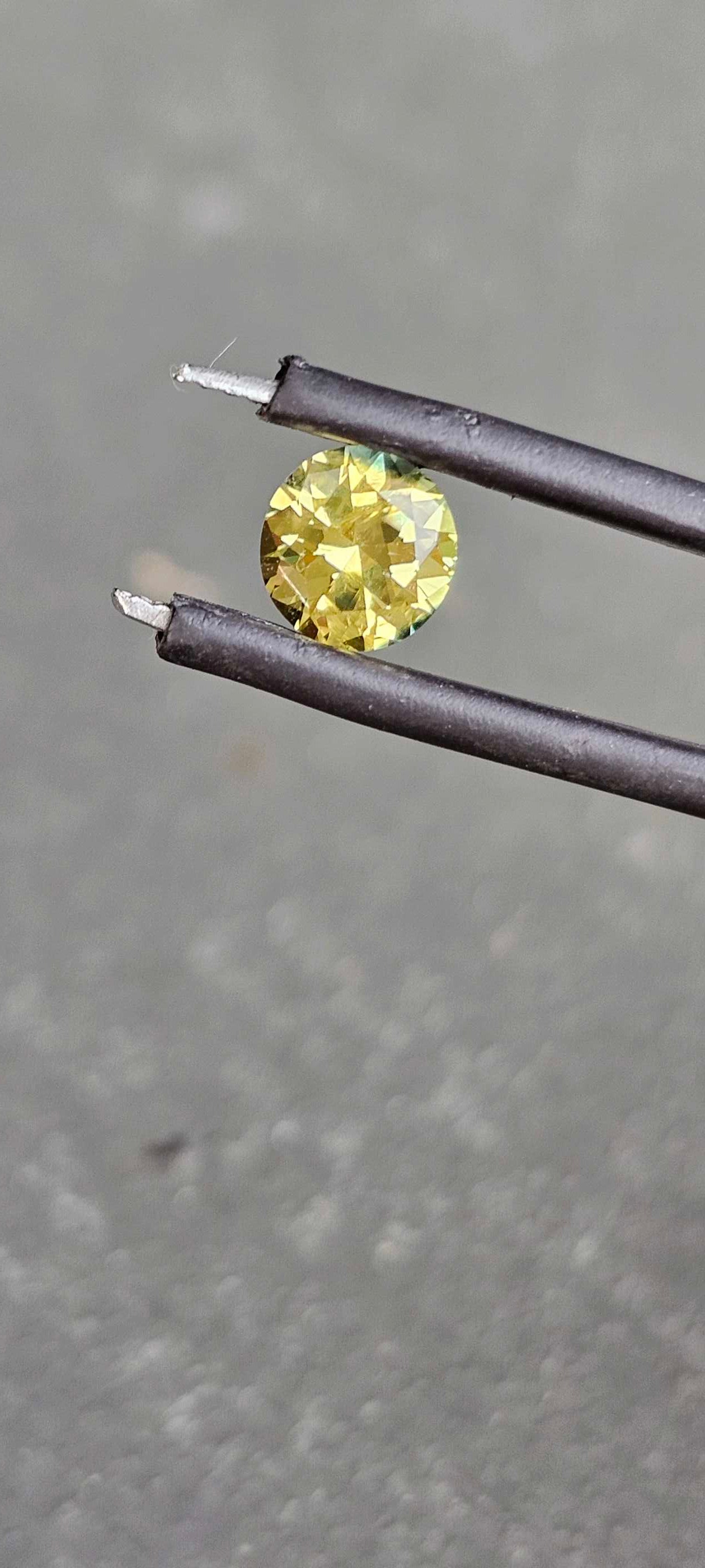 Yellow blue parti sapphire 1.2cts