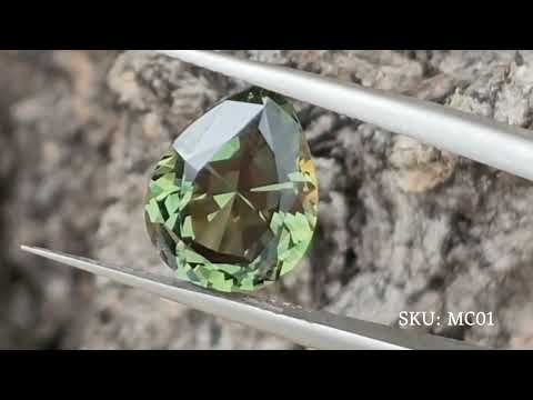4.1ct forest green pear cut sapphire